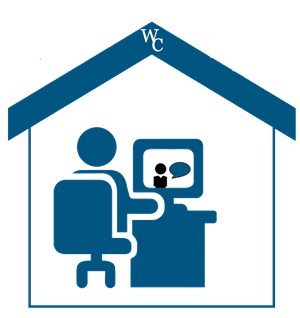 person watching a webinar on the computer at home