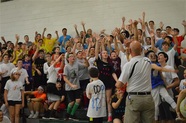 Dr. Cognato tosses t-shirts into the crowd 